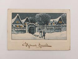Old Christmas card postcard with snowy cottages