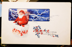 Antique postage Christmas postcard with Santa Claus