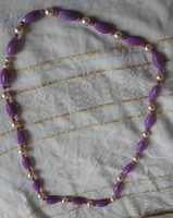 Purple necklace with white pearls