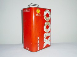 Retro shell x100 oil can - car car motor oil oil gasoline gas station advertisement - 1970s