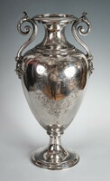 Large silver vase with plastic vine tongs