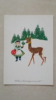 Old Christmas postcard with cartoon postcard of a little deer and a snowy forest