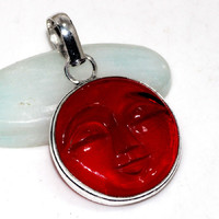 Rarity! Red coral face on a silver pendant