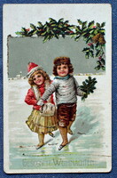 Antik Karácsonyi üdvözlő glitteres litho képeslap  korcsolyázó kisleány kisfiú fenyőág  Tábori posta