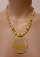 Showy, handmade glass pearl necklace with round pendant
