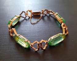 Nagyon szép zöld csiszolt üveggel díszített arany színű karkötő