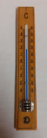 Old marked wooden wall thermometer