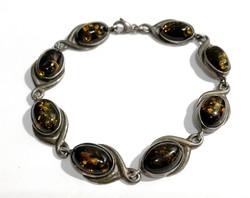 Silver bracelet with amber stones