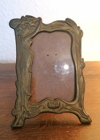 A rare (almost no longer available on the market) copper picture frame depicting an art nouveau female figure