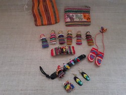 Handcrafted bracelets, earrings, hairpins and small dolls are sold together in their own holders
