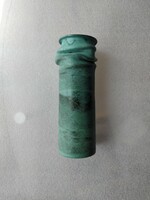 Unmarked green vase with crumpled walls