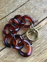 Mimco brand design bracelet with amber plastic and copper fittings