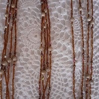 Threads strung with pearls, garlands