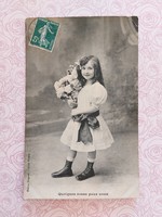 Old postcard little girl photo postcard flowers