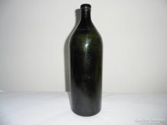 Antique dark green glass bottle - 32 cm high - from the early 1900s