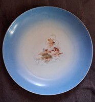 Antique decorative bowl with putts,