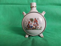 An antique Kispest porcelain water bottle, a shepherd playing the flute and his lover, a dancing couple, two separate scenes!