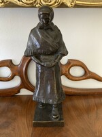 Bronze statue of Cúcs Ferenc - going to church