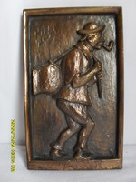 Bronze statue wall painting depicting a beggar