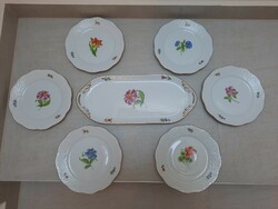 Herend porcelain cake set with different floral patterns.
