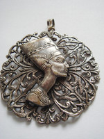 Old women's vintage metal pendant
