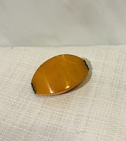 Amber brooch with silver socket