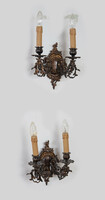 Bronze wall arm in a pair - with tendril decor
