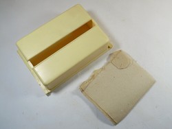 Retro old plastic 2-part lockable toilet paper holder and toilet paper - from the 1960s-70s