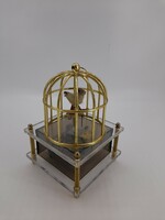 Musical dancing bird in a cage
