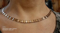 Rózsaaranyozott( vastagon aranyozott aranyhatásu ) vésettmintás ezüst ,elegáns viselet