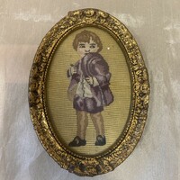 Small antique frame with needle tapestry
