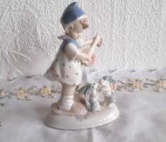 Old porcelain musical girl figure with dancing pets