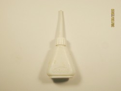 Retro oiled plastic bottle - dripping inscription - bicycle or instrument oil in it