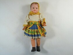 Retro toy plastic doll in fabric clothes approx. 1970s