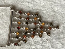 Silver necklaces with three colors of amber