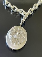 A wonderful silver bracelet with a patron saint pendant.