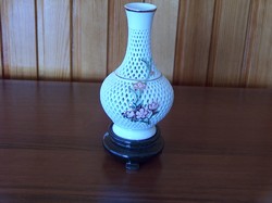 Perforated patterned floral vase with flawless soles