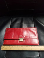 Red leather jewelry wallet.