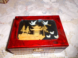 Musical lacquer box with a cork miniature insert on the top and a jewelry holder