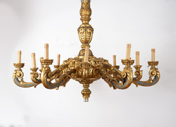 Gilded wooden chandelier with plastic lion heads (12 arms)