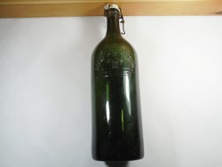 Antique old buckled glass bottle with dew water inscription and Hungarian royal crown coat of arms