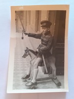 Old child's photo vintage photo of little boy riding hussar
