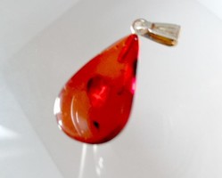 Small amber pendant with silver hanger