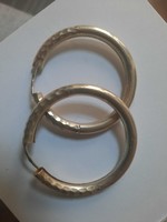 Silver hoop earrings with engraved discs