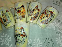 On a tray of eosin, hand-painted porcelain brandy set.