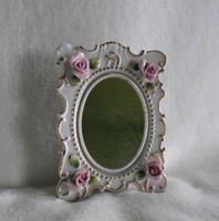 Small table mirror with antique porcelain support