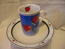 Colorful heart-shaped mug with a dragon om sign, also for Valentine's Day