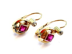 Gold earrings with red and white stones