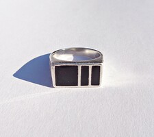 Silver ring with black inlay