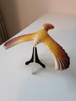 Csőrén egyensúlyozó madár retro játék